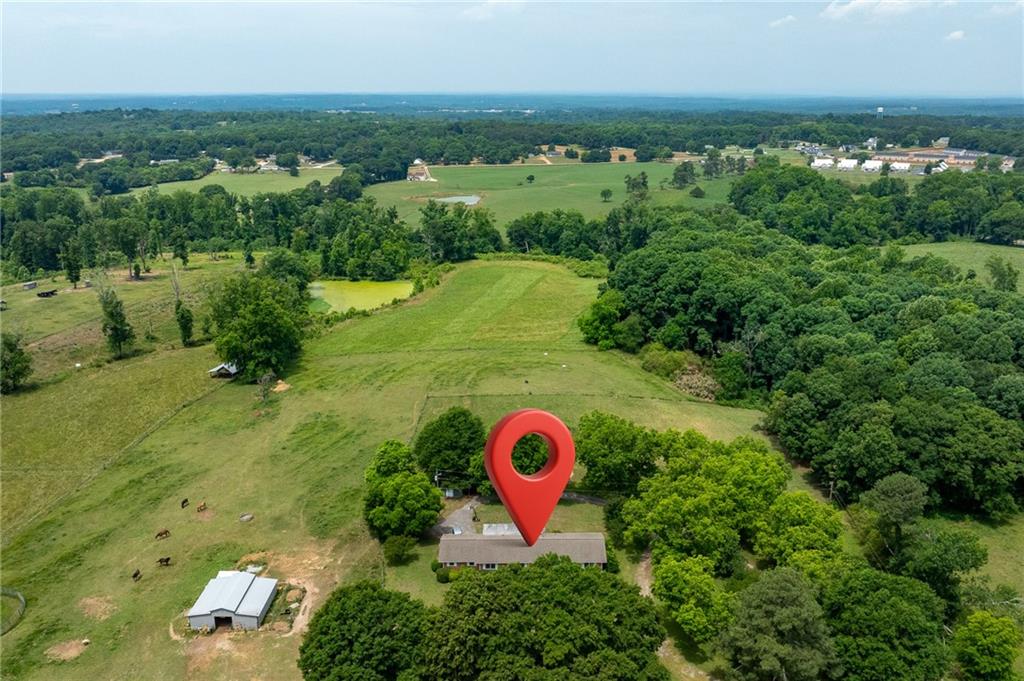 570 Wildcat Bridge Road Royston, GA 30662 - Photo 28 of 29 an aerial view of residential house with outdoor space and trees all around