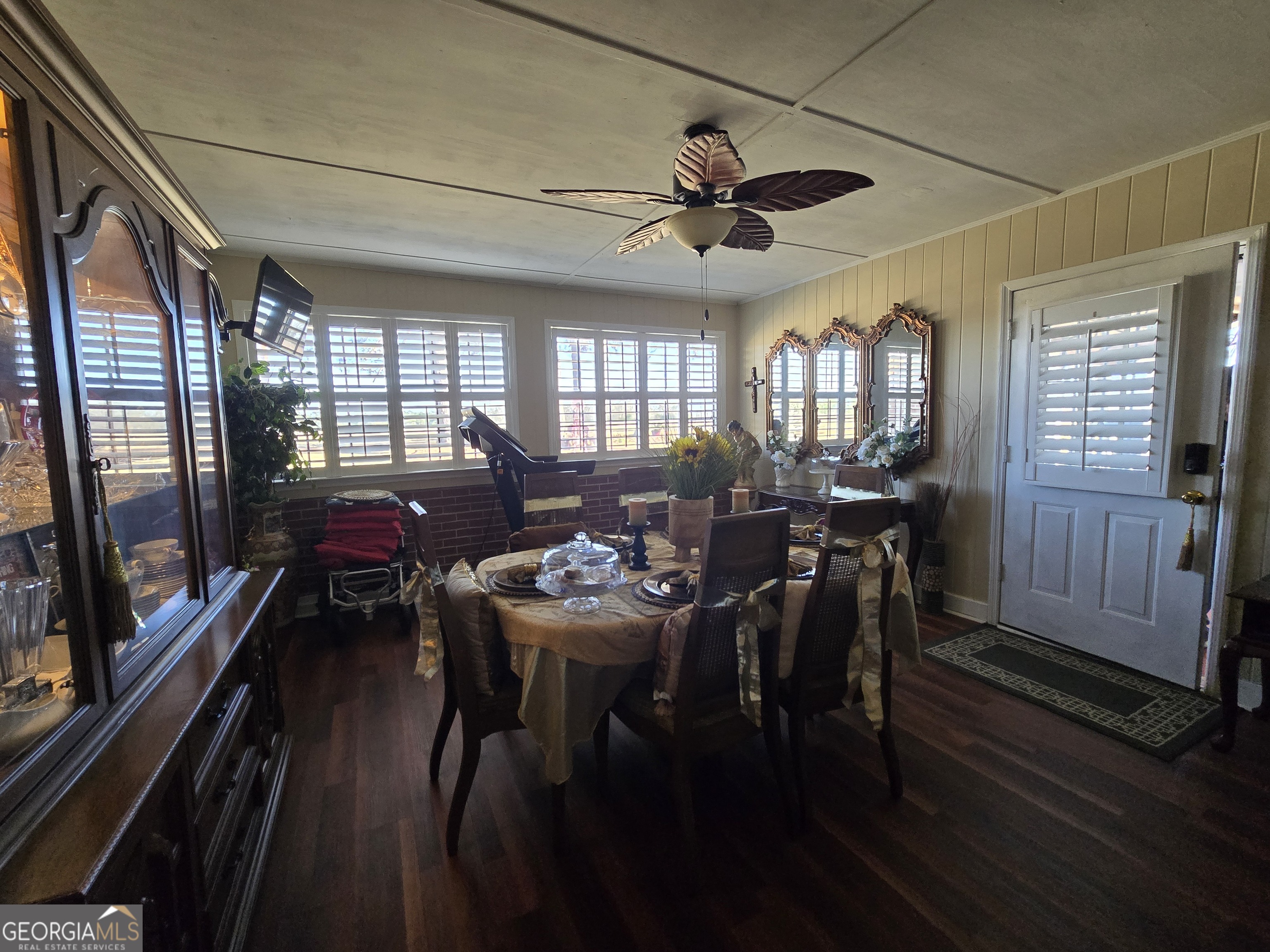 479 Mitchell Loop Bluffton, GA 39824 - Photo 16 of 51 a view of a dining room with furniture window and wooden floor