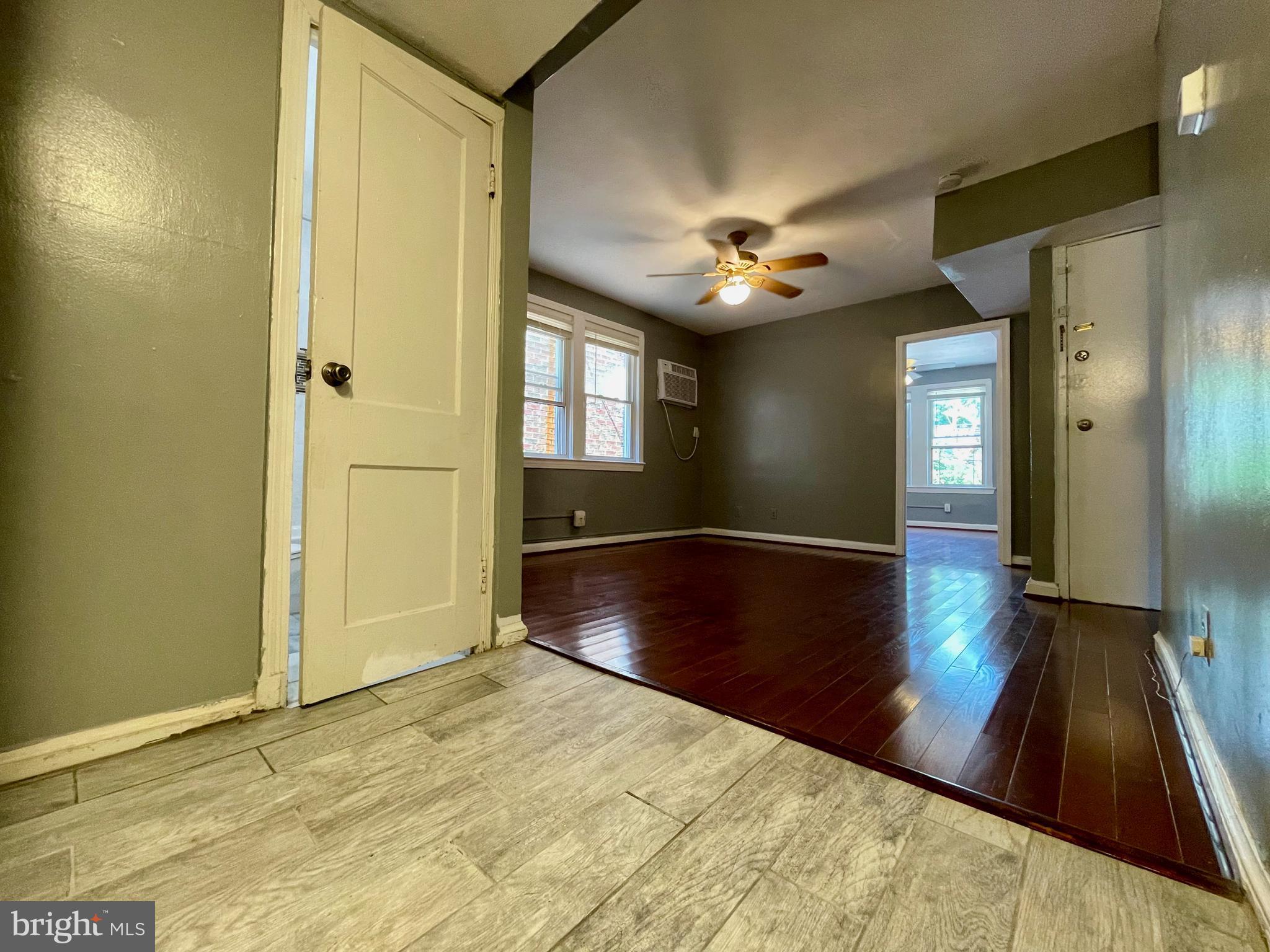 1858 Kendall Street Northeast, Unit 2 Washington, DC 20002 - Photo 14 of 38 wooden floor in an empty room with a window