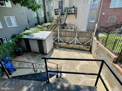 a view of balcony with furniture