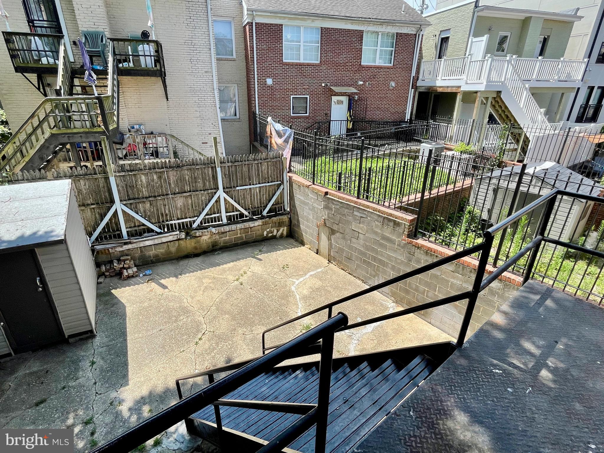 1858 Kendall Street Northeast, Unit 2 Washington, DC 20002 - Photo 35 of 38 a view of house with a roof deck