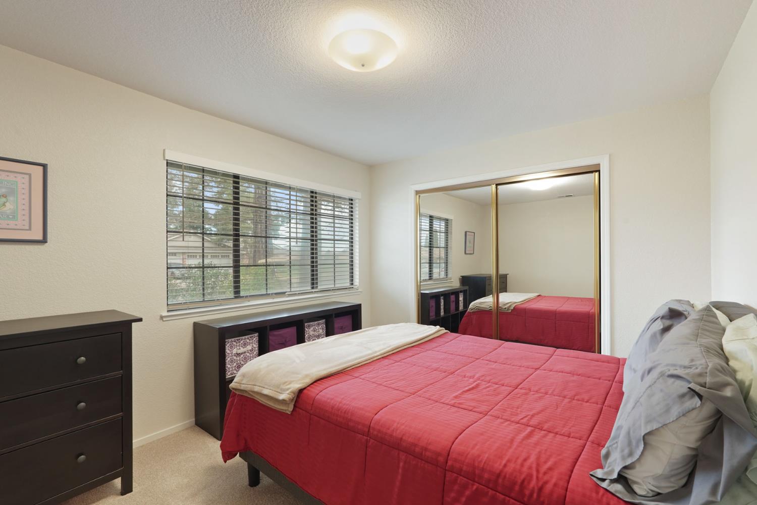 764 Adare Way Galt, CA 95632 - Photo 25 of 59 a bedroom with a bed and a window