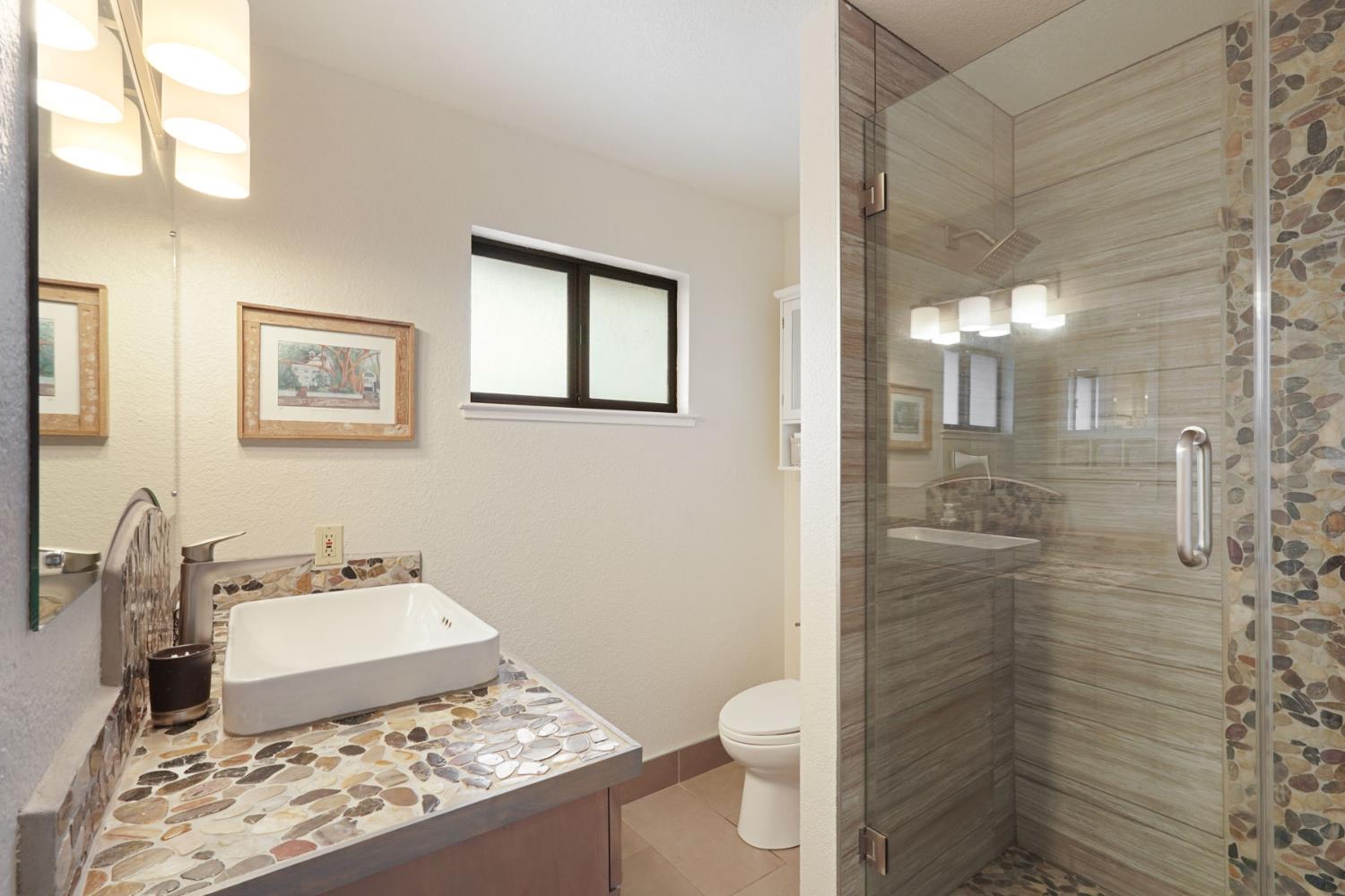 764 Adare Way Galt, CA 95632 - Photo 31 of 59 a bathroom with a sink toilet and shower