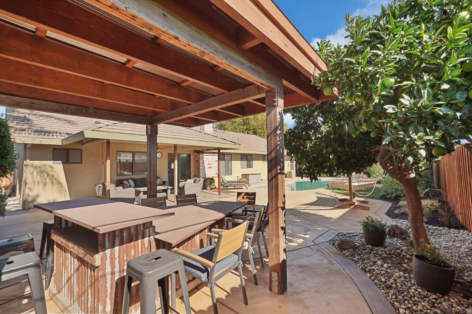 764 Adare Way Galt, CA 95632 - Photo 48 of 59 a view of a patio with chairs and tables