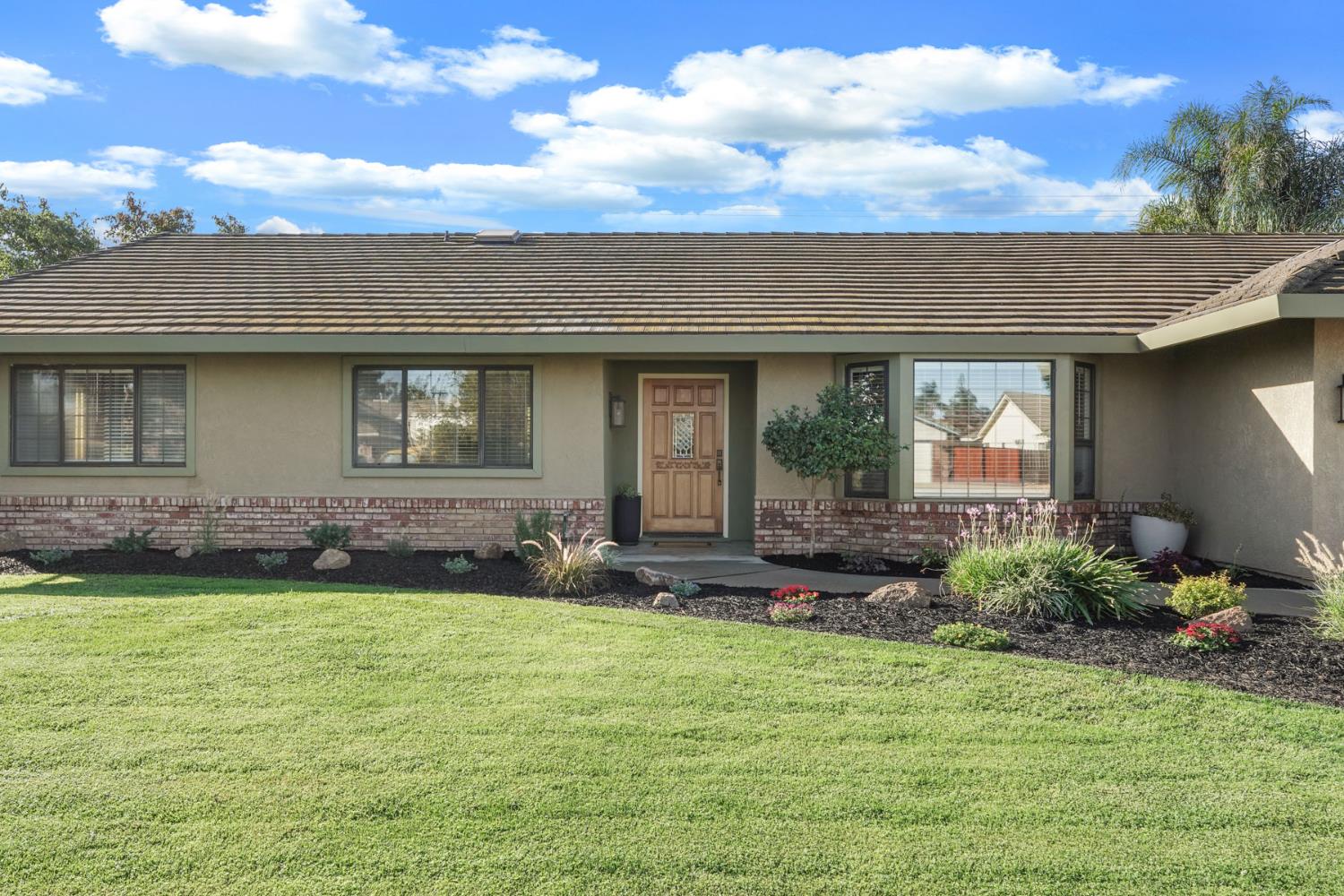 764 Adare Way Galt, CA 95632 - Photo 58 of 59 a front view of a house with garden