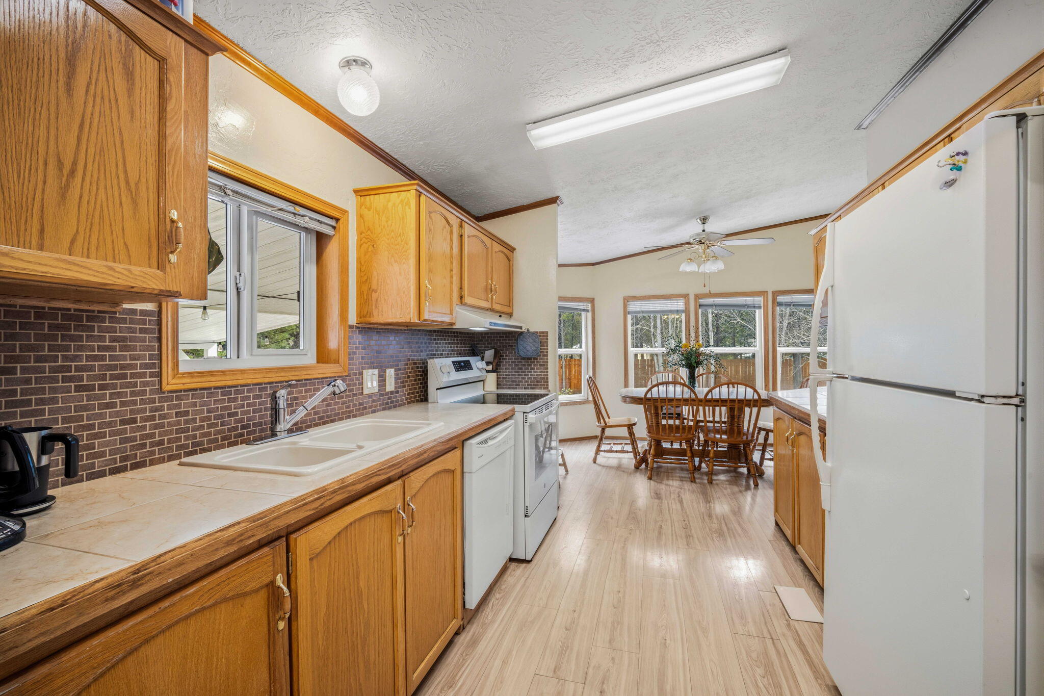 147135 Bills Road Gilchrist, OR 97737 - Photo 4 of 45 Galley style kitchen with lots of storage opportunities
