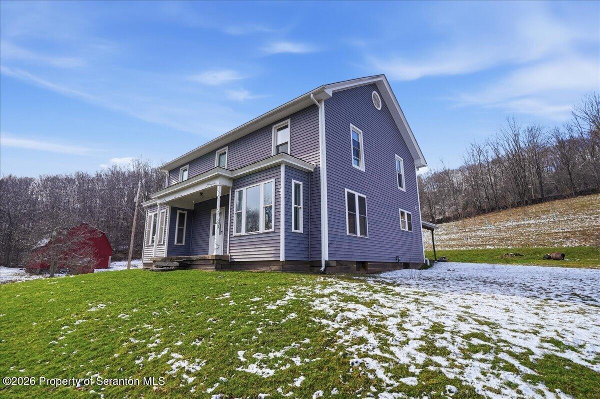 795 Wescott Road New Milford, PA 18834 - Photo 12 of 81 a front view of house with yard and green space