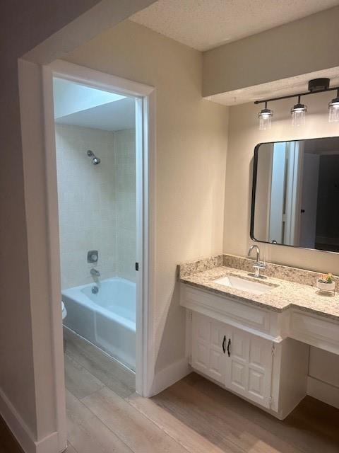 401 Willow Way Wylie, TX 75098 - Photo 12 of 19 a bathroom with a tub a double vanity sink and mirror