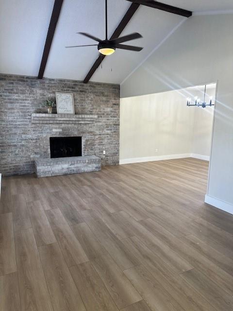 401 Willow Way Wylie, TX 75098 - Photo 13 of 19 an empty room with wooden floor fireplace and windows