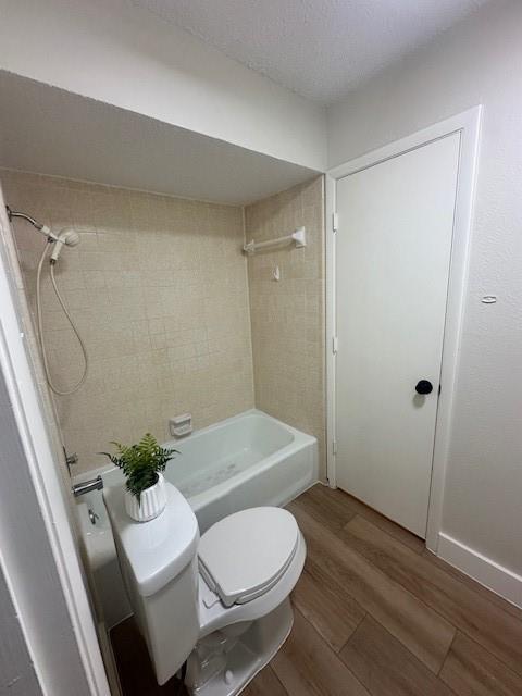 401 Willow Way Wylie, TX 75098 - Photo 16 of 19 a white toilet sitting next to a bathroom sink and a shower