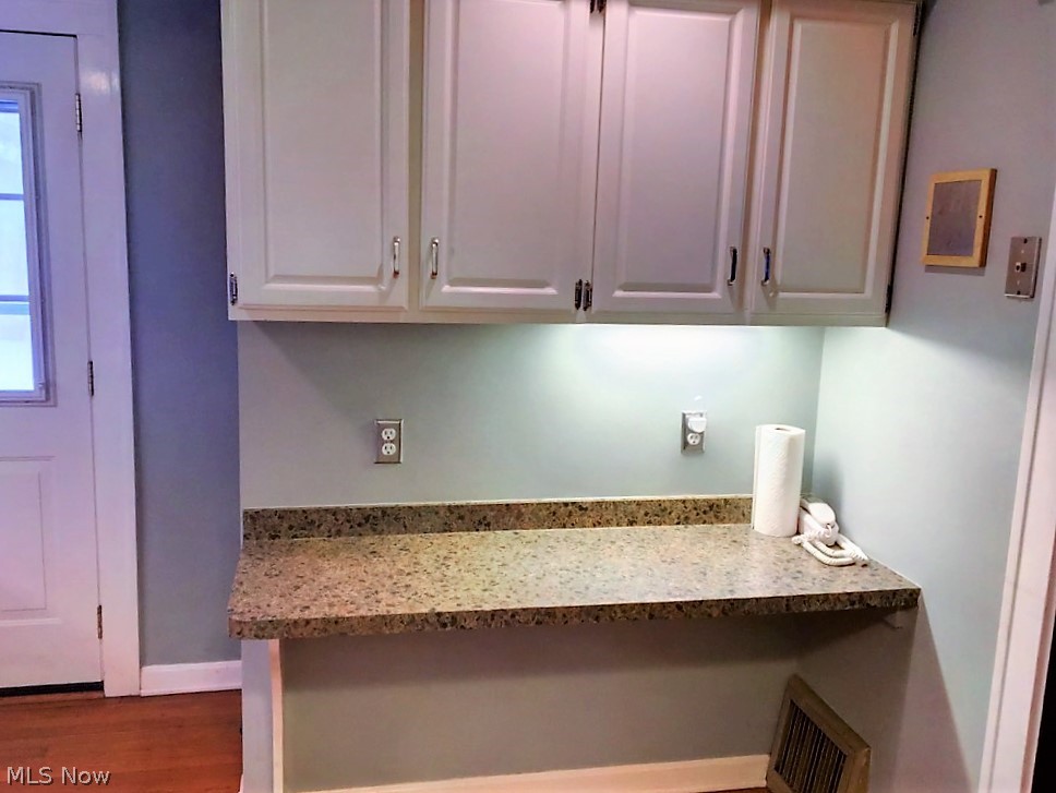 3775 Lowell Road Cleveland Heights, OH 44121 - Photo 8 of 23 Nice work counter in kitchen with under cabinet lighting.