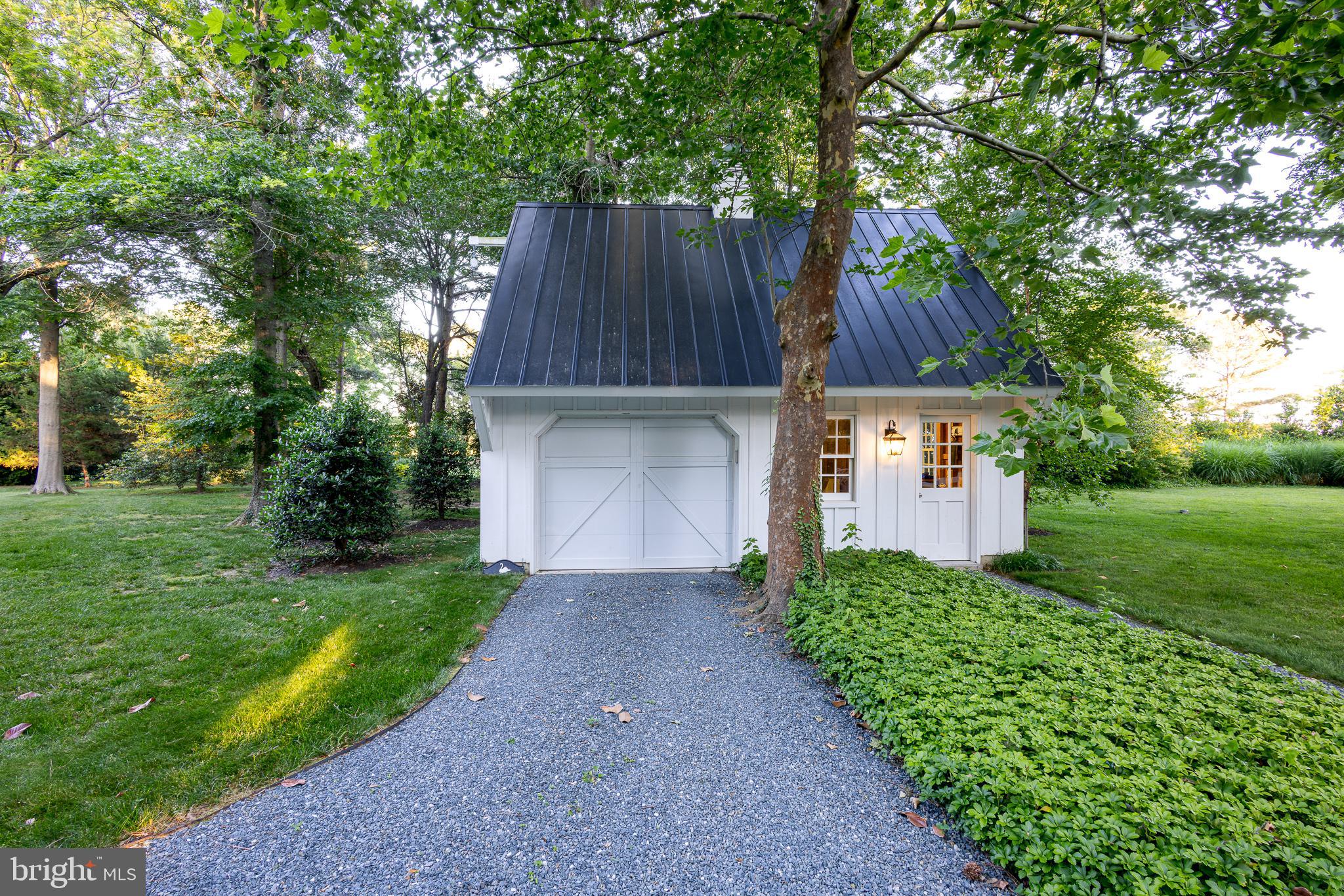 24878 West Ferry Neck Road Royal Oak, MD 21662 - Photo 14 of 74 Detached garage with metal roof, 2nd floor storage