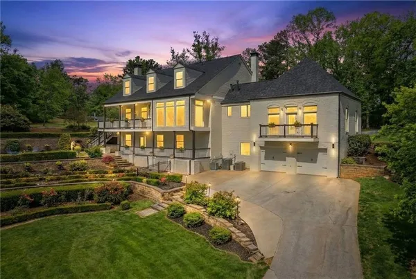 a view of a house with a swimming pool