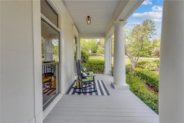 a bedroom with a bed and a night stand