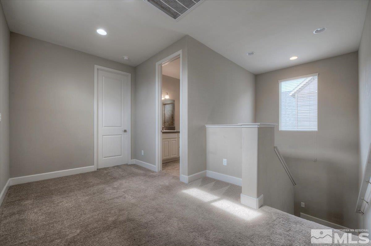 300 Mt Rose Street Reno, NV 89509 - Photo 15 of 26 an empty room with windows and closet