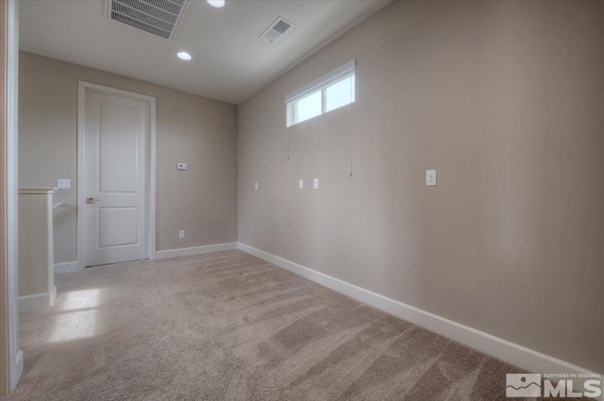 300 Mt Rose Street Reno, NV 89509 - Photo 16 of 26 an empty room with an entryway