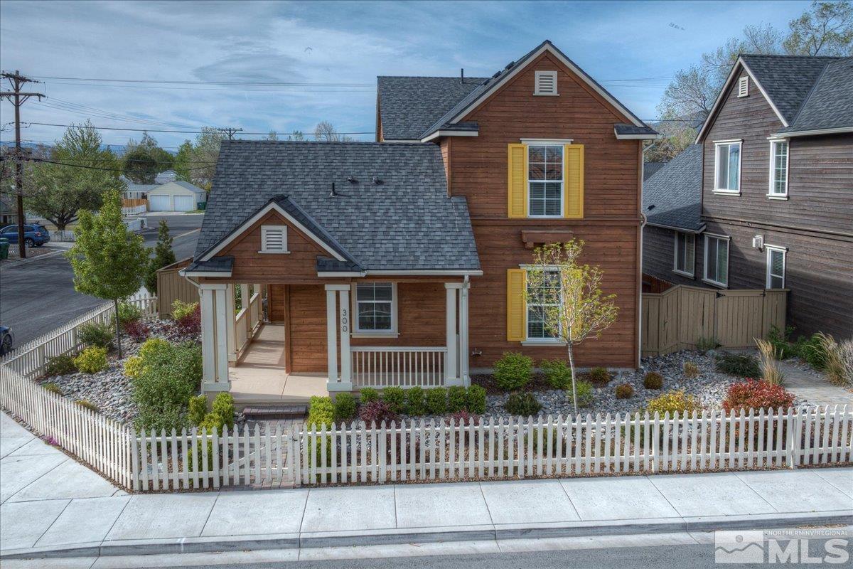 300 Mt Rose Street Reno, NV 89509 - Photo 2 of 26 a front view of a house with a yard