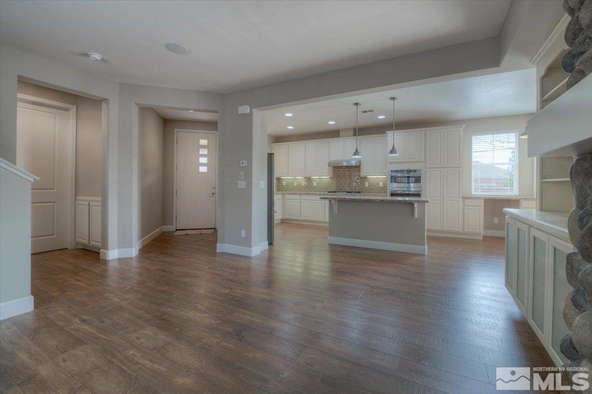 300 Mt Rose Street Reno, NV 89509 - Photo 5 of 26 a view of kitchen with cabinets and wooden floor