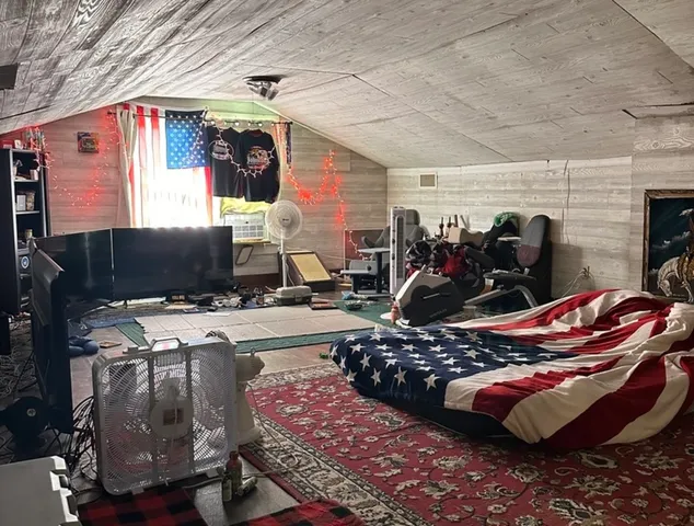 a kitchen with stainless steel appliances granite countertop a refrigerator and a stove