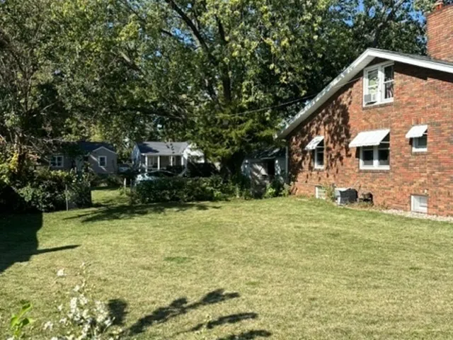 a front view of house with yard