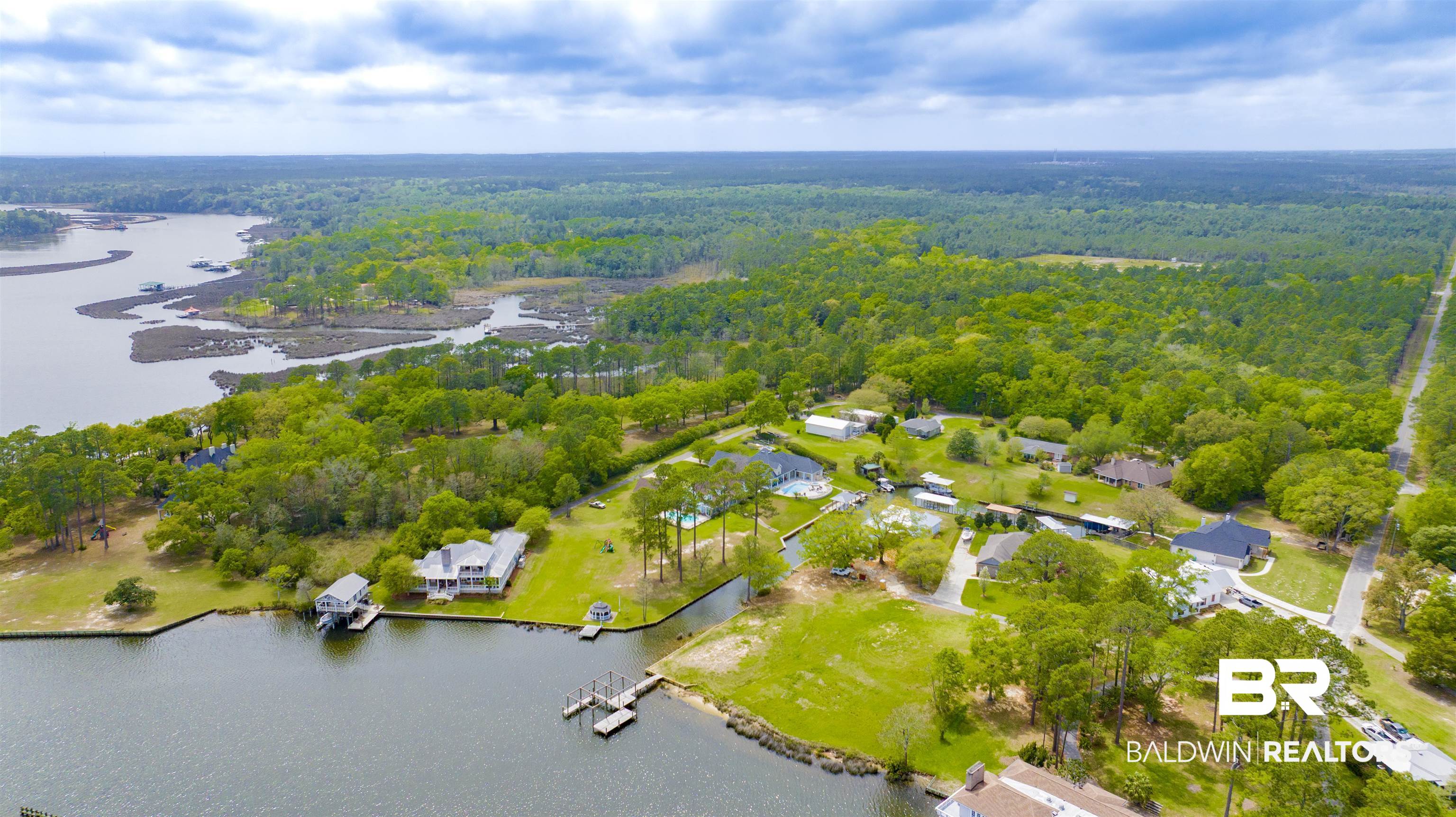 0 South Windsor Road South Theodore, AL 36582 - Photo 22 of 22 Aerial view of a heavily wooded area and a large body of water