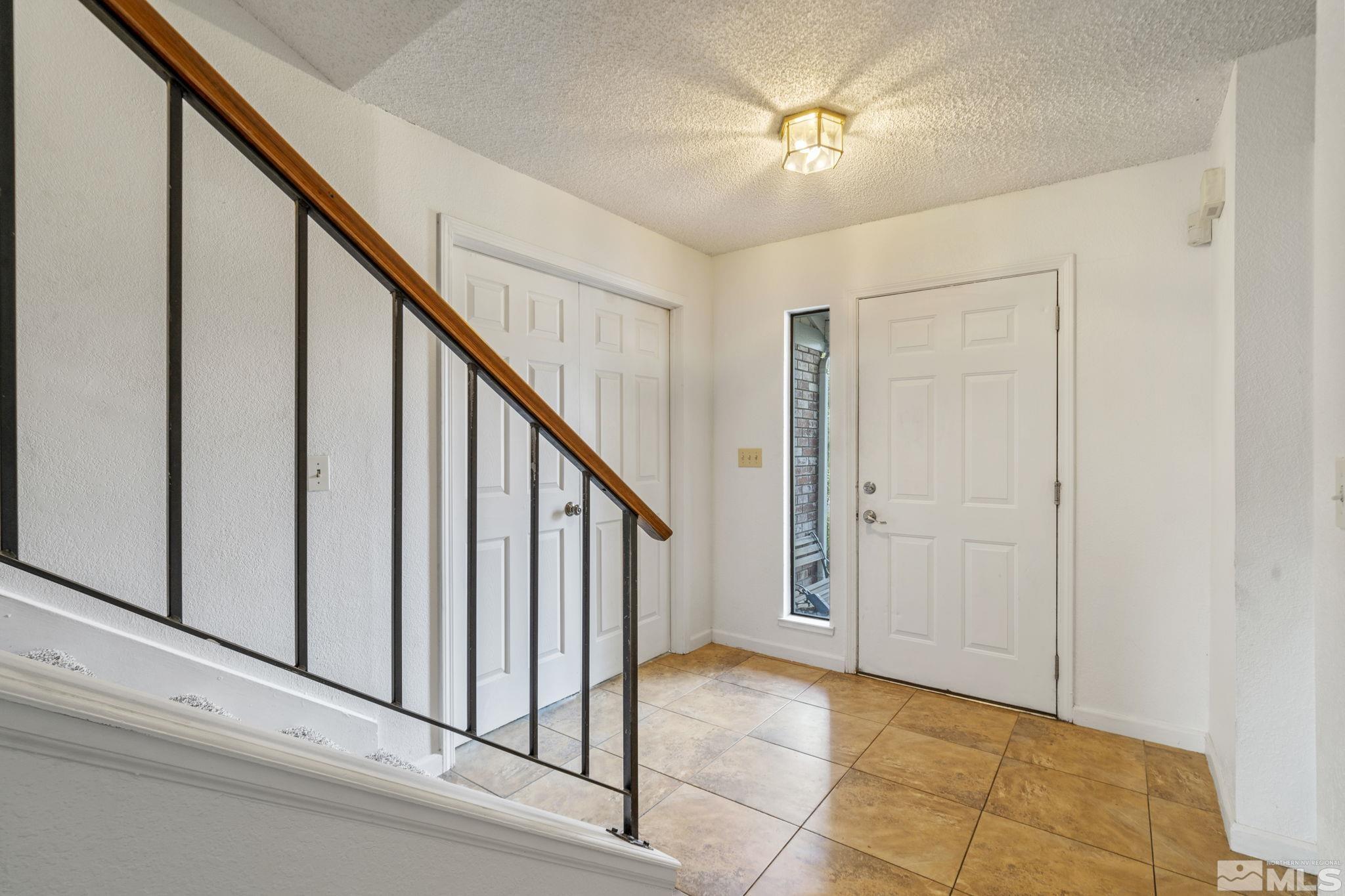 95 Cliff View Drive Reno, NV 89523 - Photo 5 of 39 a view of an entryway with staircase