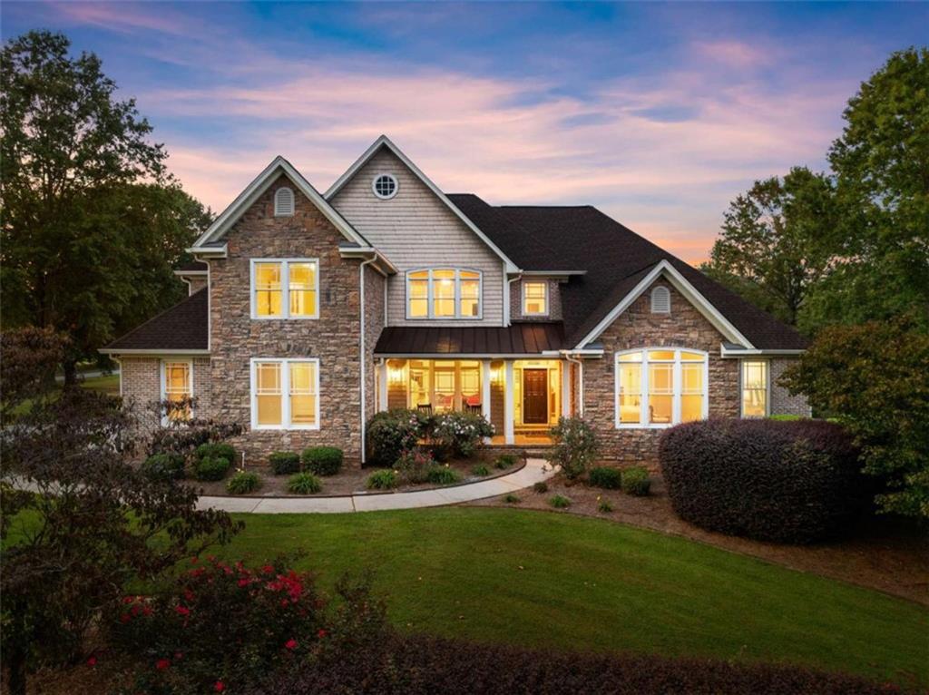 526 Orchard Drive Clarkesville, GA 30523 - Photo 2 of 81 a front view of a house with a yard and green space