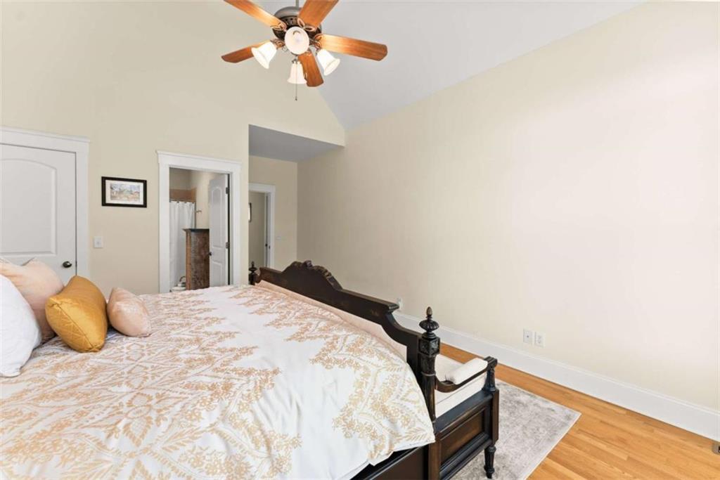 526 Orchard Drive Clarkesville, GA 30523 - Photo 36 of 81 a bedroom with a bed and ceiling fan