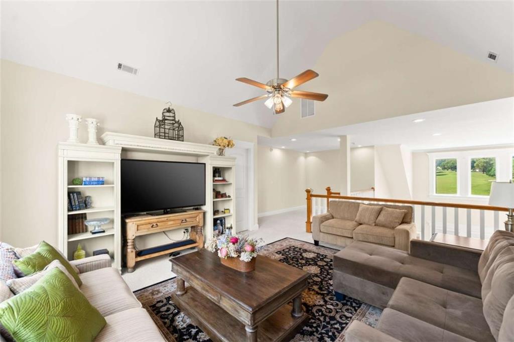 526 Orchard Drive Clarkesville, GA 30523 - Photo 40 of 81 a living room with furniture and a flat screen tv