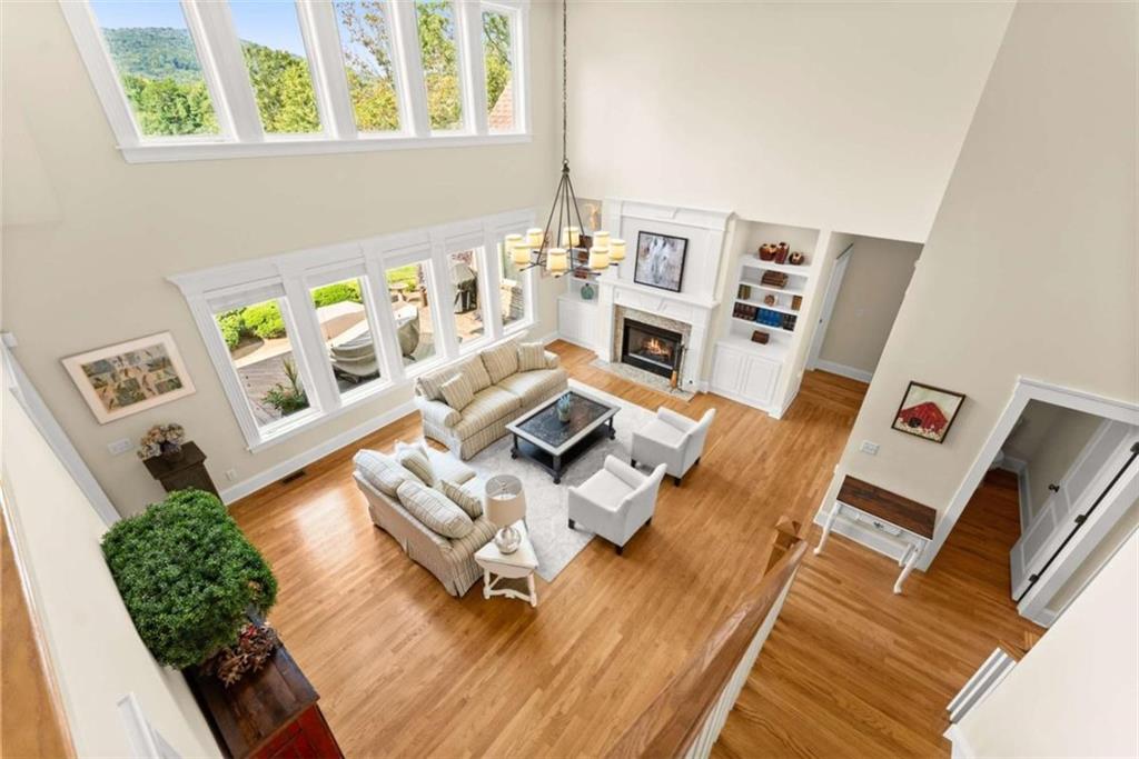 526 Orchard Drive Clarkesville, GA 30523 - Photo 42 of 81 a living room with furniture and a floor to ceiling window