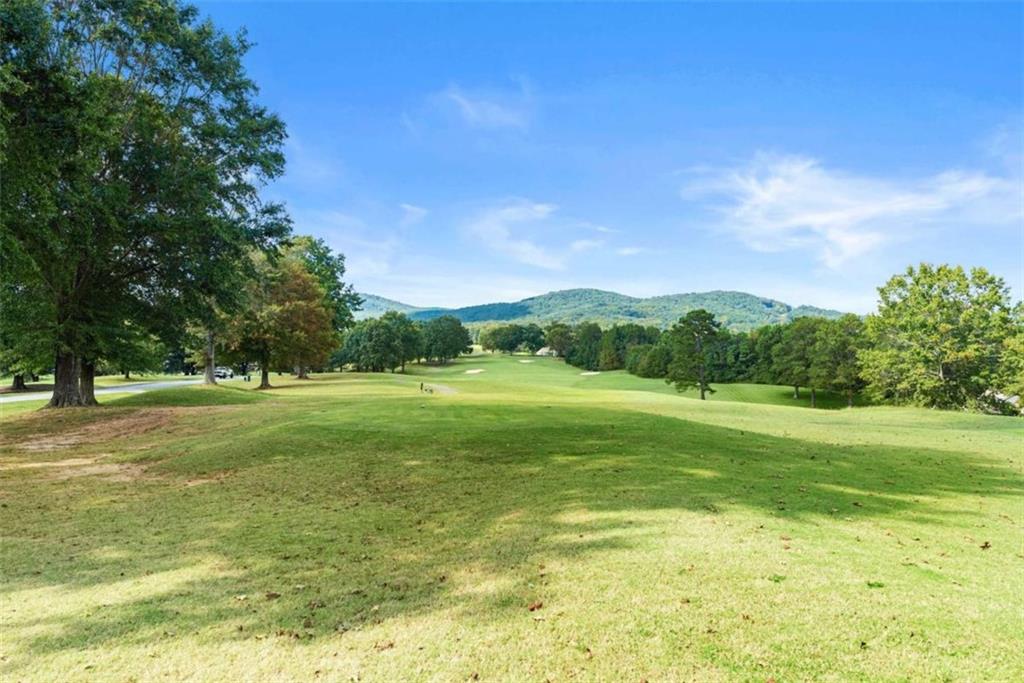 526 Orchard Drive Clarkesville, GA 30523 - Photo 67 of 81 a view of a green field with clear sky