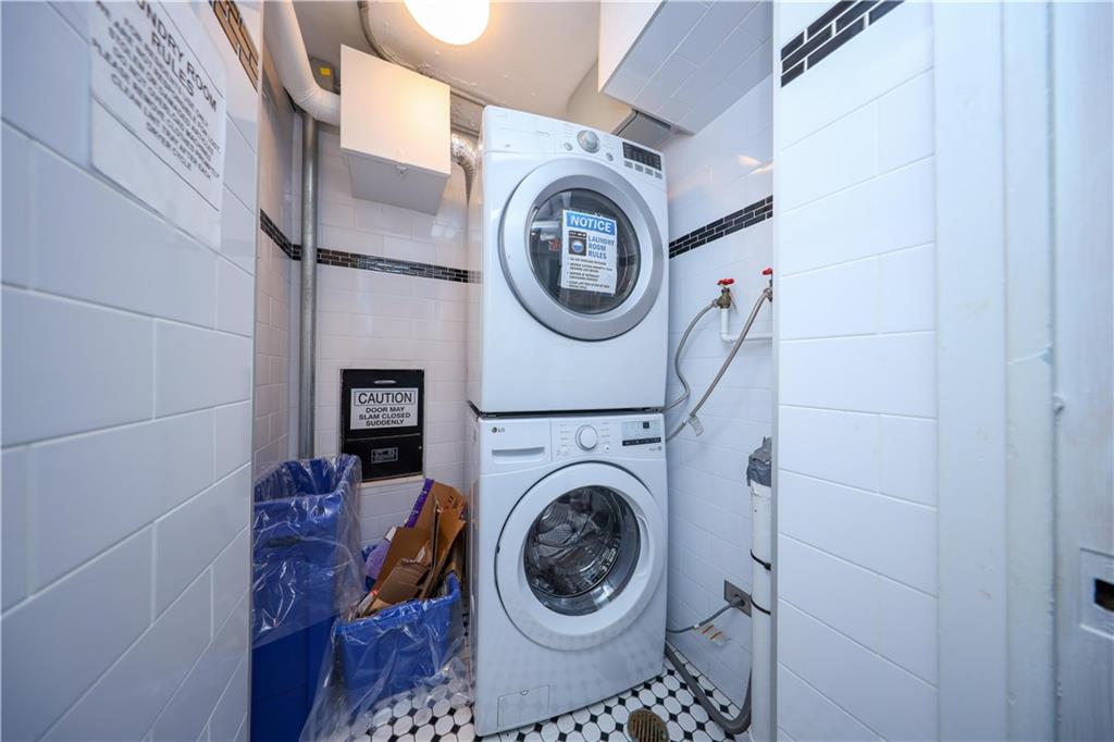 8901 Shore Road, Unit 7B Brooklyn, NY 11209 - Photo 11 of 12 a view of washer and dryer in a utility room