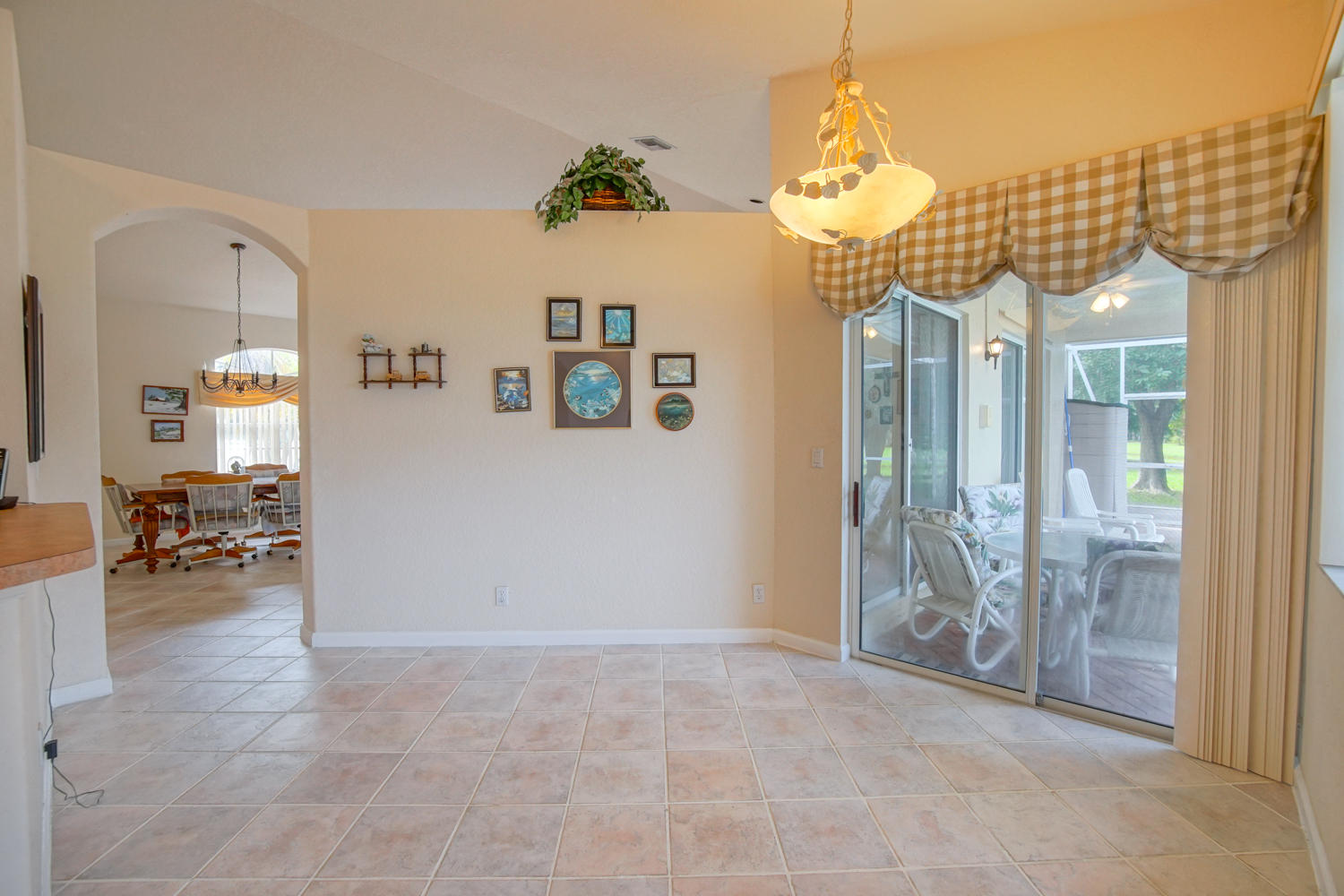107 Nottingham Road Royal Palm Beach, FL 33411 - Photo 8 of 27 Breakfast area open to kitchen