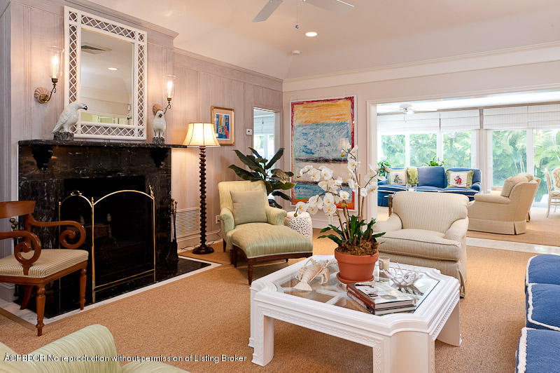 304 Plantation Road Palm Beach, FL 33480 - Photo 4 of 10 a living room with furniture potted plant and a fireplace
