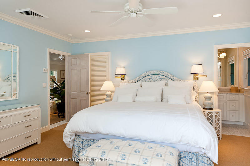 304 Plantation Road Palm Beach, FL 33480 - Photo 8 of 10 a bedroom with a bed and a dresser