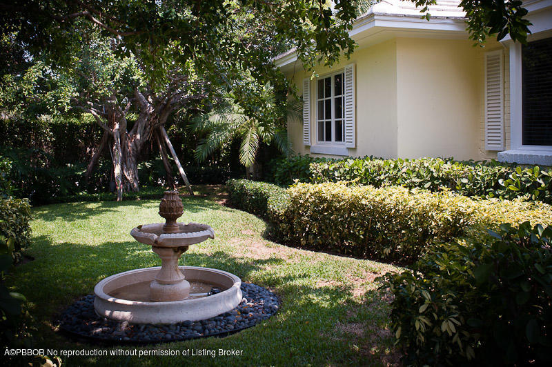 304 Plantation Road Palm Beach, FL 33480 - Photo 10 of 10 a view of an house with backyard porch and sitting area
