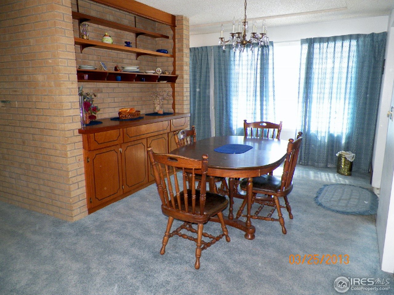 411 Ray Street Brush, CO 80723 - Photo 3 of 6 a dining room with furniture and window