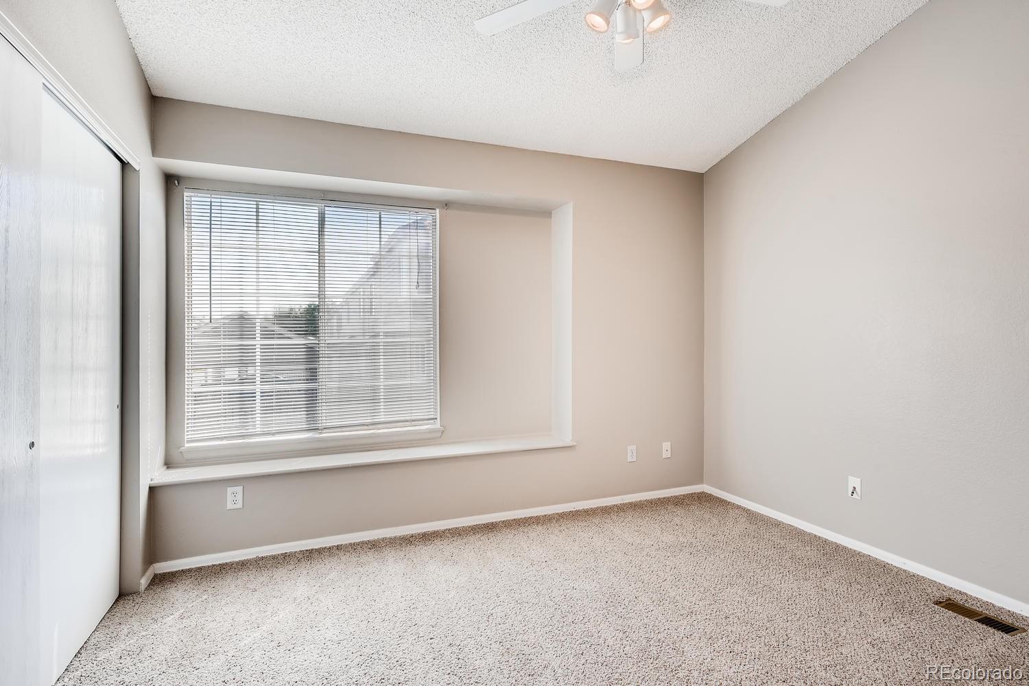 862 Summer Drive Highlands Ranch, CO 80126 - Photo 12 of 21 an empty room with a window