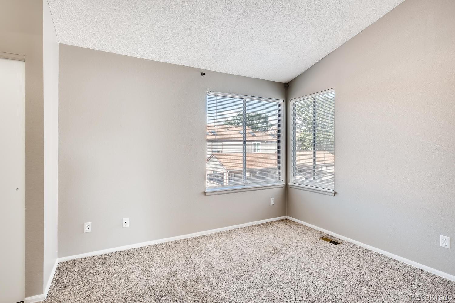 862 Summer Drive Highlands Ranch, CO 80126 - Photo 15 of 21 an empty room with windows
