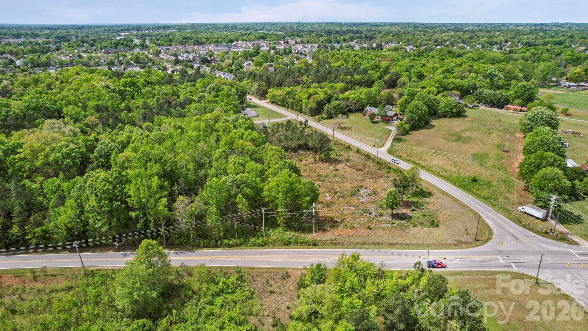 0 Faith Church Road Indian Trail, NC 28079 - Photo 13 of 21 a view of a yard with potted plants
