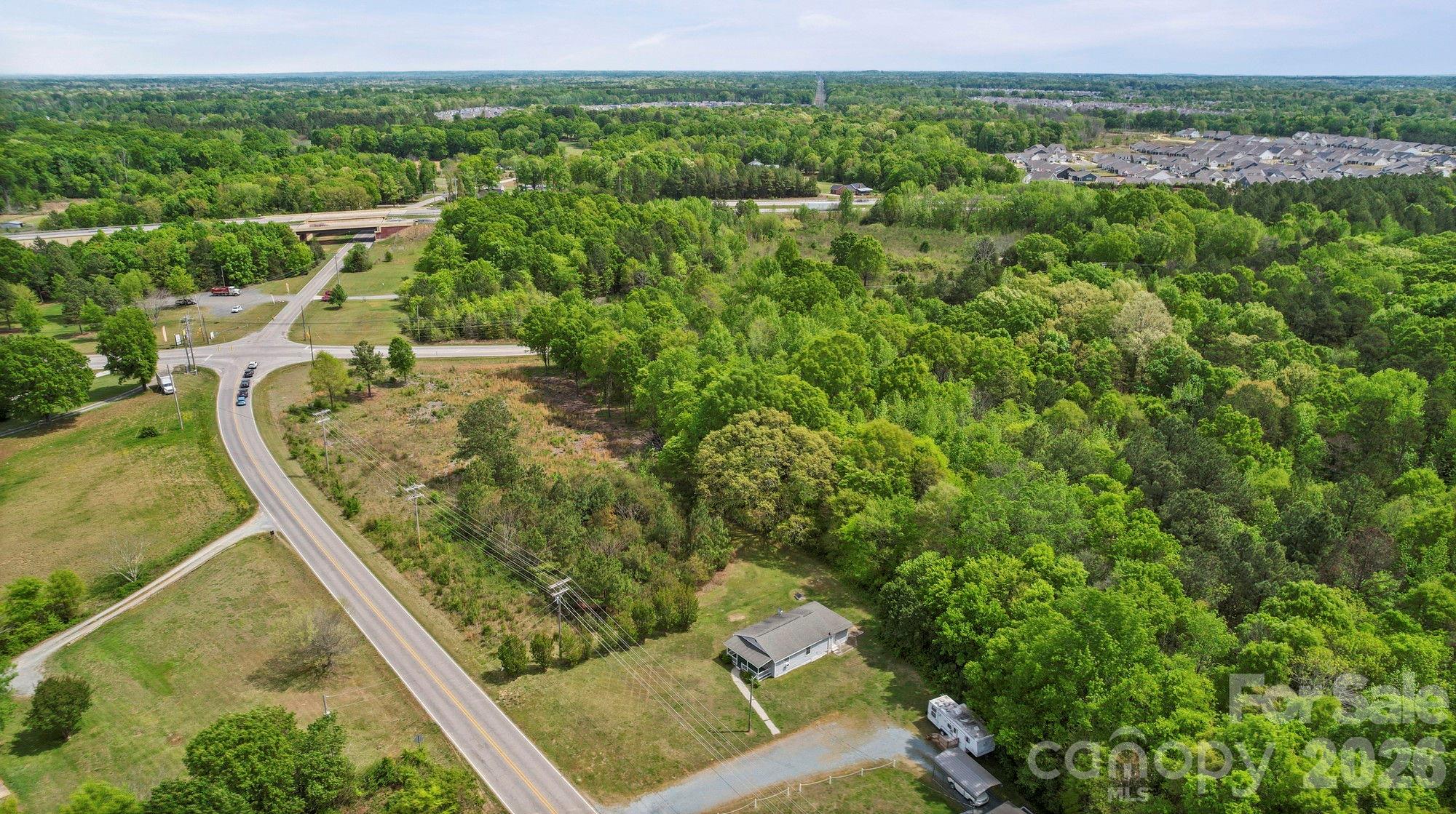 0 Faith Church Road Indian Trail, NC 28079 - Photo 15 of 21 a view of a yard with an outdoor seating