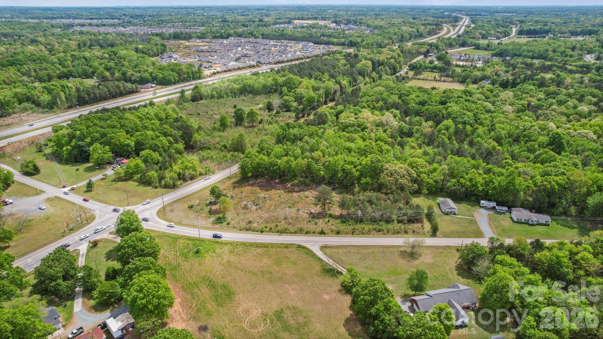 0 Faith Church Road Indian Trail, NC 28079 - Photo 2 of 21 an aerial view of a residential houses with outdoor space