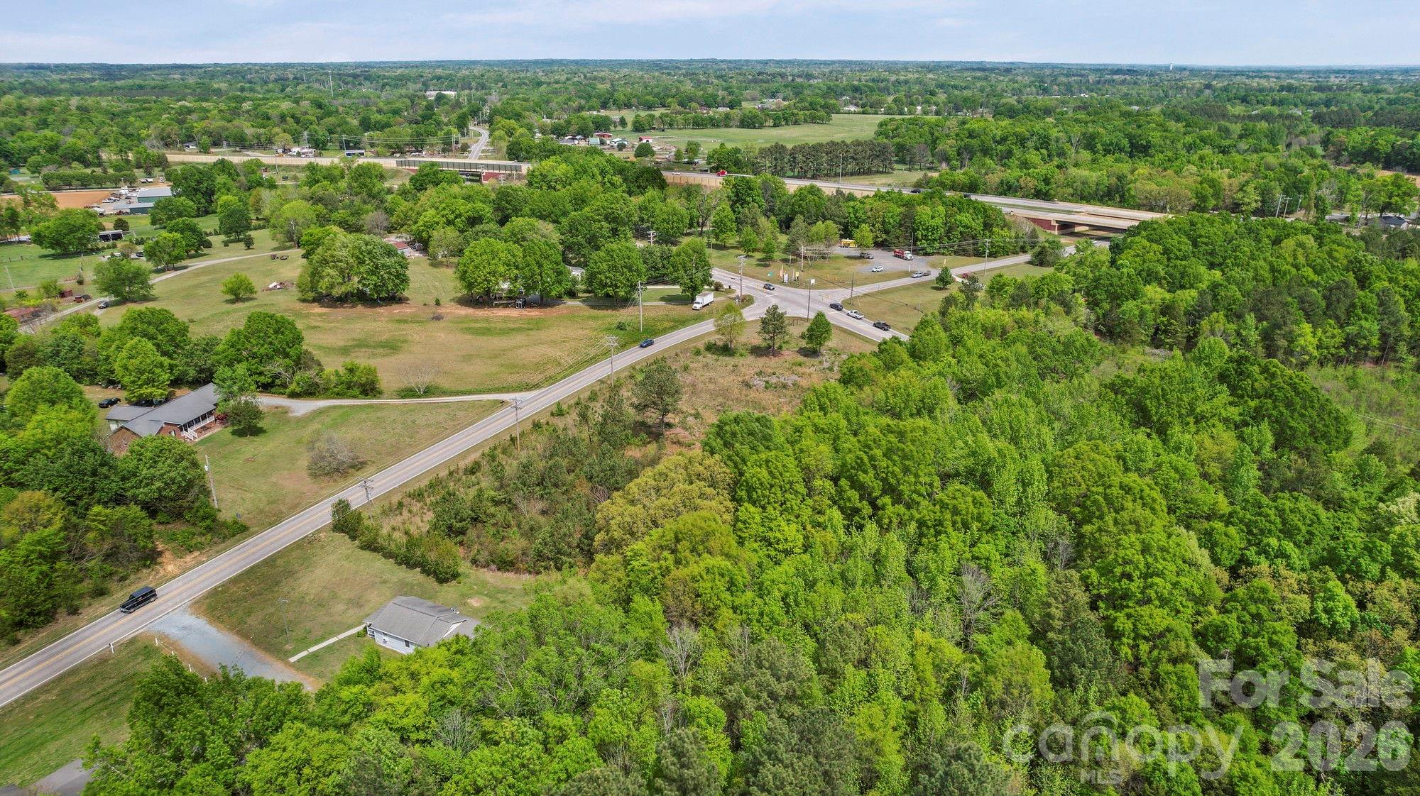 0 Faith Church Road Indian Trail, NC 28079 - Photo 21 of 21 a view of a city with lush green forest