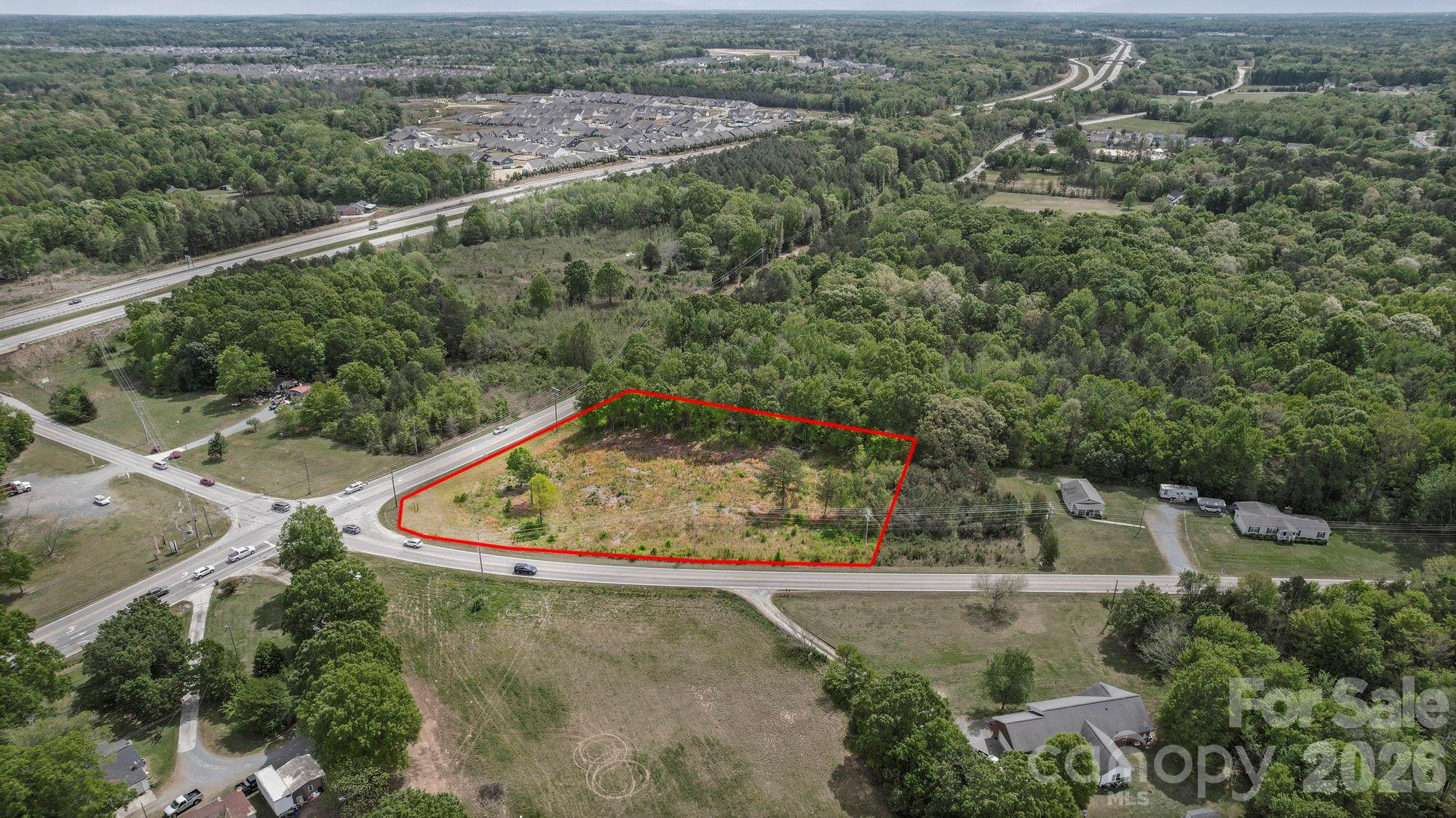 0 Faith Church Road Indian Trail, NC 28079 - Photo 3 of 21 an aerial view of a house with a yard