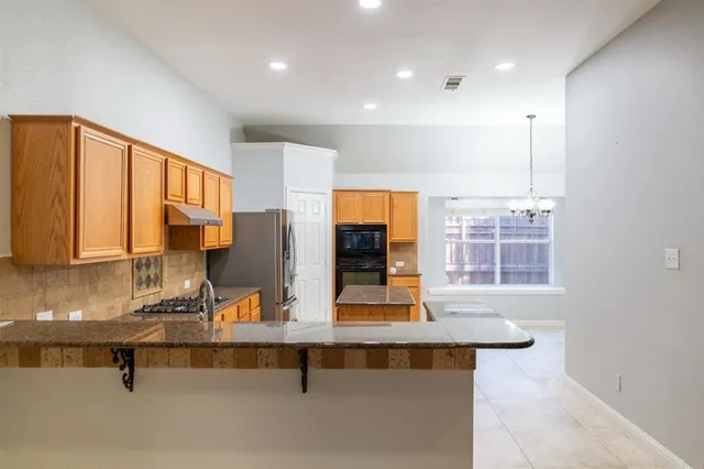 a kitchen with counter top space