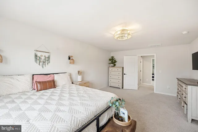 a view of living room with granite countertop furniture and fireplace
