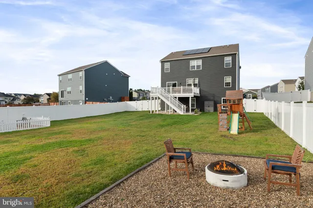 swimming pool view with a outdoor seating