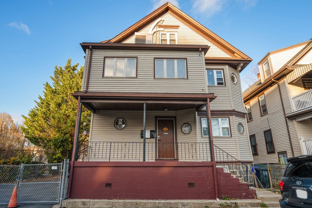 19 Carmen Street, Unit 2 Boston, MA 02121 - Photo 17 of 18 a front view of a house with a porch