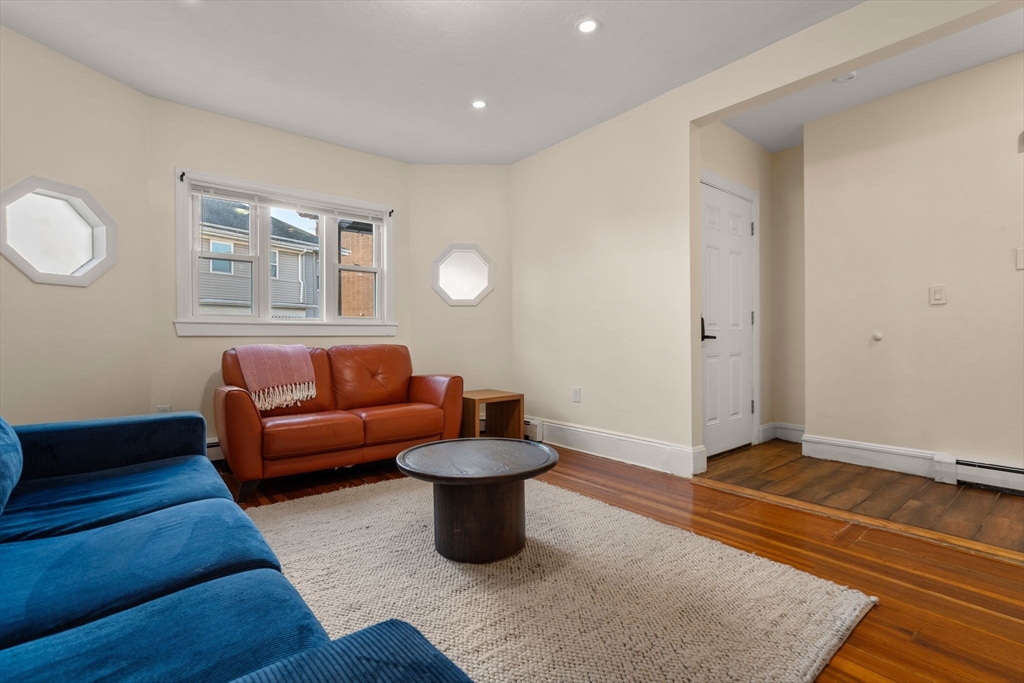 19 Carmen Street, Unit 2 Boston, MA 02121 - Photo 3 of 18 a living room with furniture