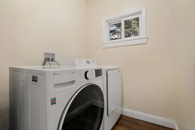 a utility room with dryer and washer